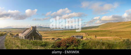 Pasture landscape and ruin near Portmagee, County Kerry, Ireland Stock Photo