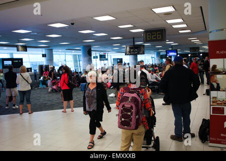 Passengers wait to board a Westjet aircraft at Pearson International Airport in Toronto, Ont. Stock Photo