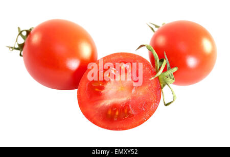 photo of delicious small red tomatoes isolated on white background Stock Photo