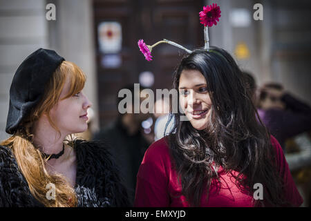 April 23, 2015 - Two young girls with flowers in the hair run one of the countless stands of roses on St Jordi in Barcelona © Matthias Oesterle/ZUMA Wire/ZUMAPRESS.com/Alamy Live News Stock Photo