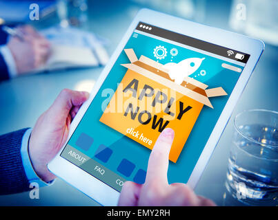 Man Using a Digital Tablet Online Application Stock Photo