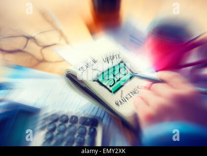 Office Writing Search Update Ranking SEO Concept Stock Photo