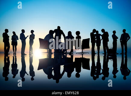 Silhouettes of Diverse Business People with Different Activities Stock Photo