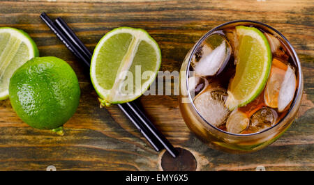 Cuba Libre Drink on a wooden table. Selective focus Stock Photo
