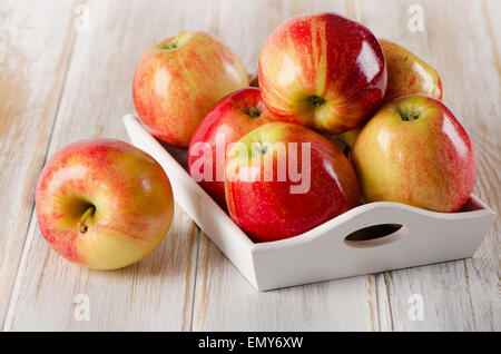 Fresh red apples  on  wooden table. Selective focus Stock Photo