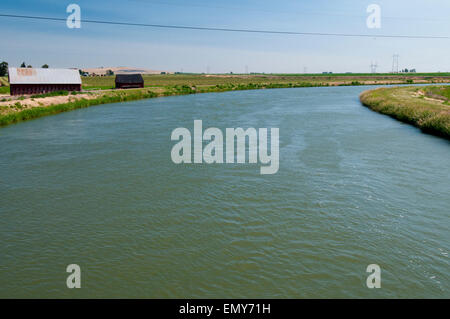 Irrigation canal below Milner Dam in south-central Idaho Stock Photo