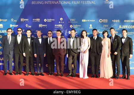 Beijing, China. 23rd April, 2015. Cast members of the movie ''Helios'' directors Lok Man Leung(5L) and Lu Jianqing(1L), actors Chang Chen(2L), Nick Cheung(4L), Jacky Cheung(6L), Wang Xueqi(7L), Shawn Yue(4R) and South Korean actor and singer Choi Siwon pose for photos during the closing ceremony of the 5th Beijing International Film Festival. Credit:  SIPA Asia/ZUMA Wire/Alamy Live News Stock Photo