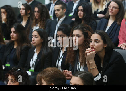 Berlin, Germany. 24th Apr, 2015. Armenian people follow the debate on the occasion of the anniversary of the massacres of Armenians in the Ottoman Empire in 1915/1916 during a parliamentary session of the German Bundestag in Berlin, Germany, 24 April 2015. Photo: Stephanie Pilick/dpa/Alamy Live News Stock Photo