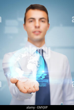 friendly buisnessman showing globe on the palm Stock Photo