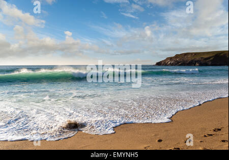 Waves at Holywell Bay, a large sandy beach near Newquay in Cornwall Stock Photo
