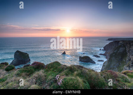 Sunset on the South West Coast path at Pentire Steps between Newquay and Padstow on the north coast of Cornwall Stock Photo