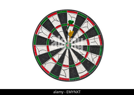 Two darts on a dartboard. One in the center, second the other off center. Isolated on white background. Stock Photo