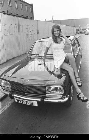 Reveille model Beulah Hughes seen here posing with a Lancia car which ...