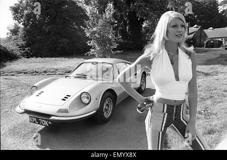 Reveille model Heidi seen here posing with a Ferrari Dino GT which is NOT A top prize in the Reveille win a car competition circa 1972 Stock Photo