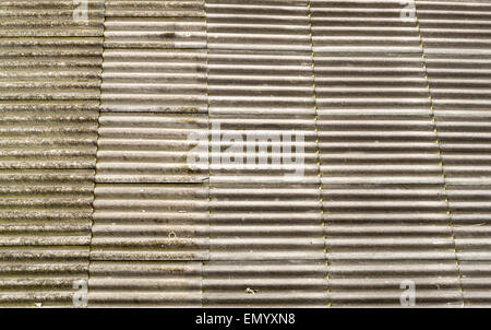 Asbestos concrete roof tiles spread across the whole frame Stock Photo