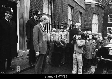 Chancellor of the Exchequer Anthony Barber goes for a short walk into the Minister's Courtyard prior to leaving number 11 Downing Street for the House of Commons to deliver his budget speech. Here he is pictured with children of Aylburton School in Glouce Stock Photo