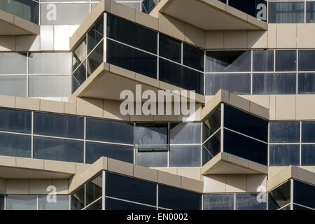 Sharp triangle window edges create acute angles in modern building design Stock Photo