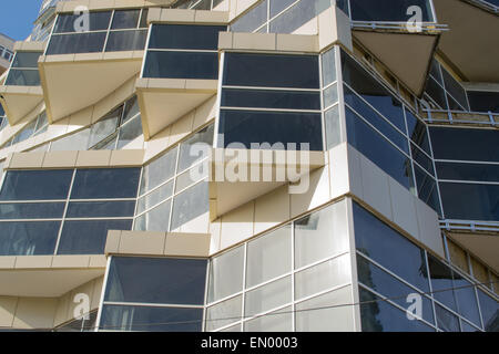 Sharp triangle window edges create acute angles in modern building design Stock Photo