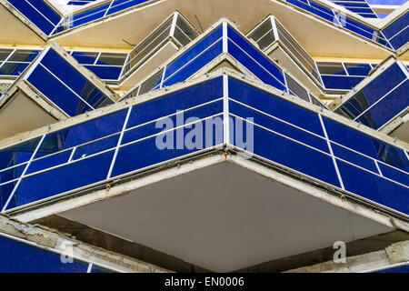 Sharp triangle window edges create acute angles in modern building design Stock Photo