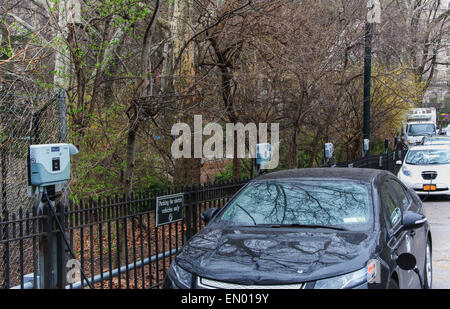 A row of electric vehicle charging stations in Central Park New York City Stock Photo