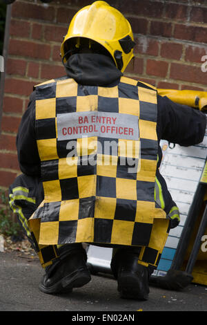 London Fire Brigade (LFB) firefighters attend a roof fire in Herne Hill, south London. Stock Photo