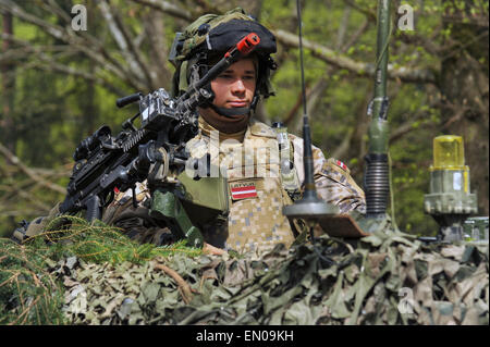 A Latvian Army soldier during training exercise Saber Junction at the Joint Multinational Readiness Center April 23, 2015 in Hohenfels, Germany. Saber Junction prepares NATO and partner nation forces for offensive, defensive, and stability operations. Stock Photo