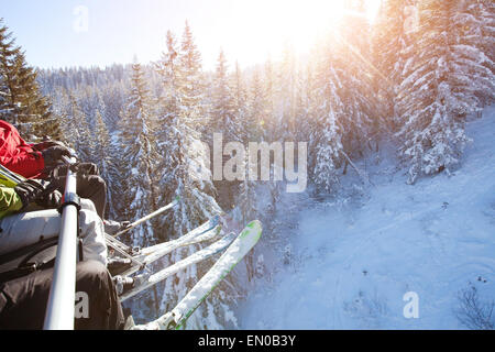 family sitting in ski lift Stock Photo