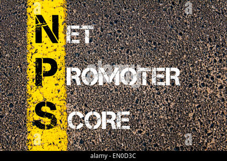 Business Acronym NPS as NET PROMOTER SCORE. Yellow paint line on the road against asphalt background. Conceptual image Stock Photo