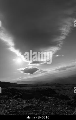 Rolling lenticular cloud formation over Mount Washington, New Hampshire in black and white monochrome. Stock Photo