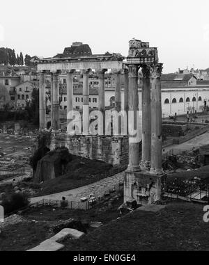 Part of the Temple of Saturn and Temple of Vespasian and Titus ruins in Rome Stock Photo
