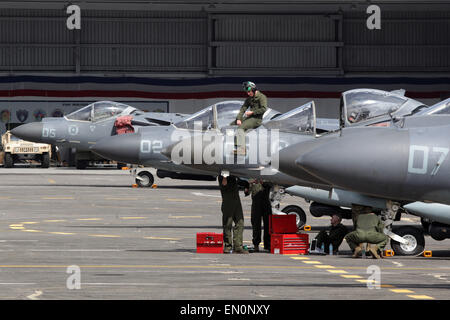 Pampanga, Philippines. 25th Apr, 2015. U.S. soldiers repair an AV-8B Harrier II Plus jet during a static display of aircrafts of the Armed Forces of the Philippines and the United States as part of the 2015 RP-US Balikatan Exercises at Clark Air Force in Pampanga Province, the Philippines, on April 25, 2015. The 'Shoulder to Shoulder' (Local name: Balikatan) exercises began in locations in five provinces of the Philippines on April 20, involving 11,500 Filipino and U.S. military personnel. Credit:  Rouelle Umali/Xinhua/Alamy Live News Stock Photo