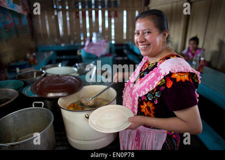 cook at work in Guatemala city market Stock Photo