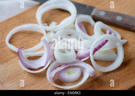 Chopped red and white onion on a cutting board Stock Photo