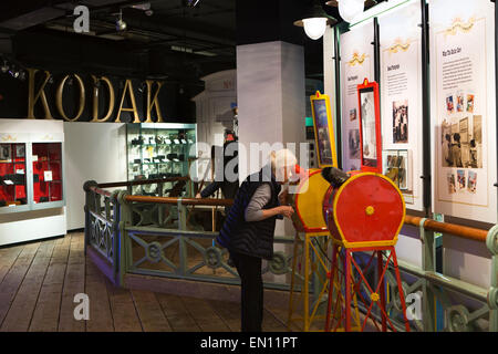 UK, England, Yorkshire, Bradford, National Media Museum, woman in Kodak photographic history gallery Stock Photo