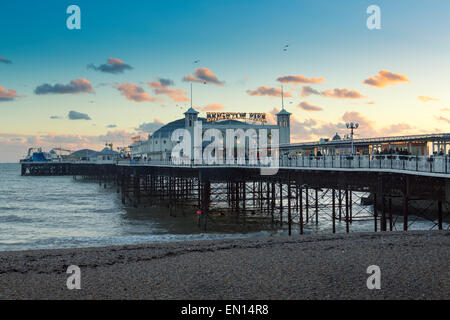 Europe, United Kingdom, England, East Sussex, Brighton, Brighton pier and beach, Palace pier, built in 1899, shoreline at dusk Stock Photo
