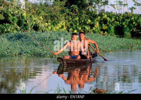 Brazil, Amazon, Tukano (Tucano) indigenous people, indigenous people fishing, dug out canoe, traditional river life, Amazonas state, Brazil Stock Photo