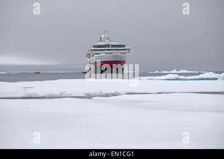 Arctic cruise ship MV Fram at the edge of the North Polar ice sheet, August 2014, Arctic Ocean north of Spitzbergen, Svalbard. Stock Photo