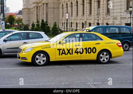 A bright coloured modern Taxi car in Vienna, Austria. Stock Photo