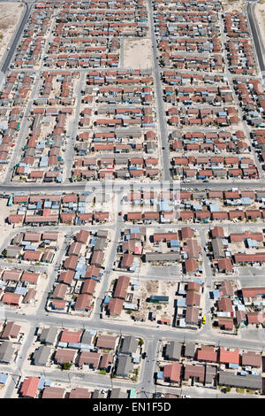 Aerial view of housing and the suburb of Delft in the Cape Flats region of Cape Town, South Africa. Stock Photo