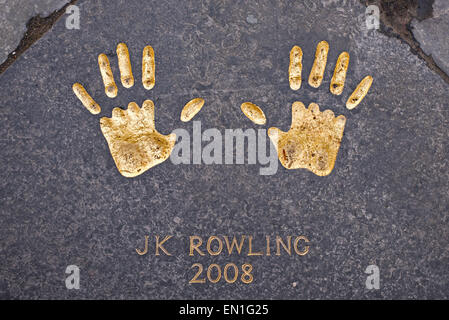 The hand prints of JK Rowling, reproduced on a flagstone in the City Chambers quadrangle.  Edinburgh Award winner 2008. Stock Photo