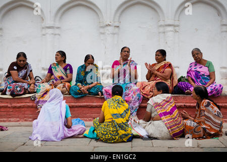 Group of women praying at Durbar Square, Kathmandu Stock Photo
