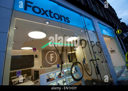 Foxtons Estate Agents window smashed and riot police using tear gas vandalised after Reclaim Brixton event April 25th 2015 Stock Photo