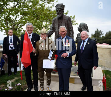 (150425) -- CANAKKALE, April 25, 2015(Xinhua) -- Irish President Michael D. Higgins(1st R), British Prince of Wales Charles(2nd R), Turkish Minister for EU Affairs Volkan Bozkir(4th R) and a Turkish veteran(3rd R) pose for a photo at the 57th Infantry Regiment Memorial in Canakkale, Turkey, April 25, 2015. Leaders and dignitaries from the UK, Ireland, Australia and New Zealand joined Turkish military delegates to attend Turkish memorial service on Saturday at the 57th Infantry Regiment Memorial, as an event of 100th anniversary of the Gallipoli Battle. (Xinhua/He Canling) Stock Photo