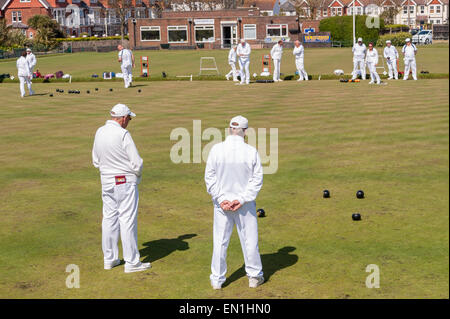 Eastbourne,  UK. 25 April 2015. Local residents take part in traditional crown green bowls near the seafront in Eastbourne . Credit:  Stephen Chung / Alamy Live News Stock Photo