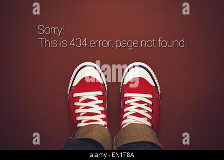 Top View of 404 Error, Page Not Found, Person in Red Sneakers Standing on Brown Background with Internet Error Message Stock Photo