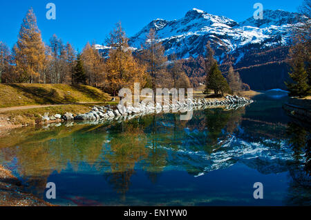 Autumn reflections on the lake Silvaplana Stock Photo