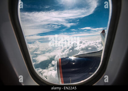 Classic image through aircraft window onto jet engine Stock Photo