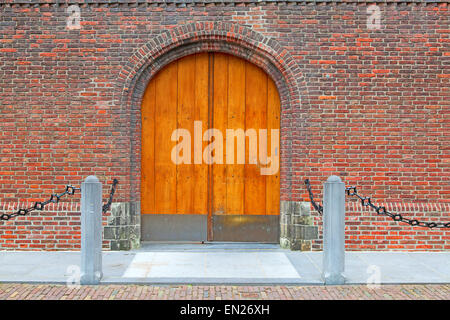 Door on the brick wall Stock Photo