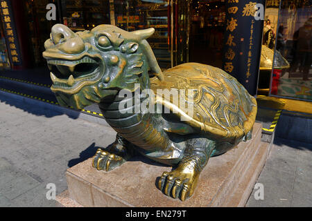 Statue of a Dragon Turtle or Bixi in the Old City, Shanghai, China Stock Photo