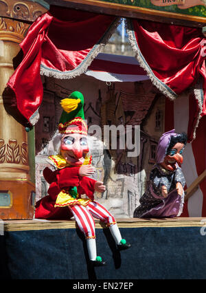 Traditional puppet show Liverpool, Merseyside, April, 2015. Punch and Judy Professor David Wilde & Red dragon at the St George's Day Festival held in the St George's Quarter, an area of the city described as the unique, historic heart of Liverpool. Stock Photo